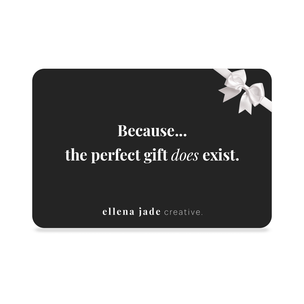 Black gift card with white text and a bow on a dark background